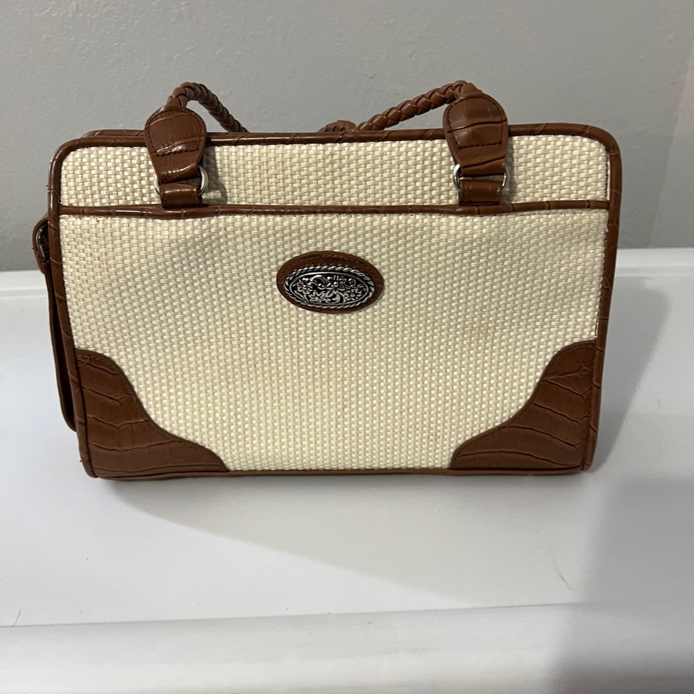 Brown and off white purse